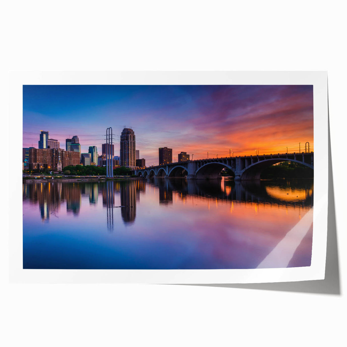 Rolled print of Minneapolis skyline in muted blues and grays, suitable as extra large wall art for dining rooms.