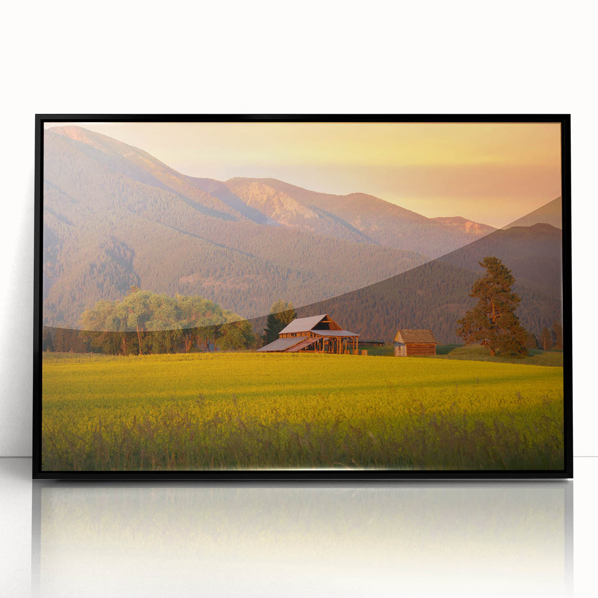 Large abstract wall art featuring sweeping Montana scenery in muted earth tones, framed in black acrylic.