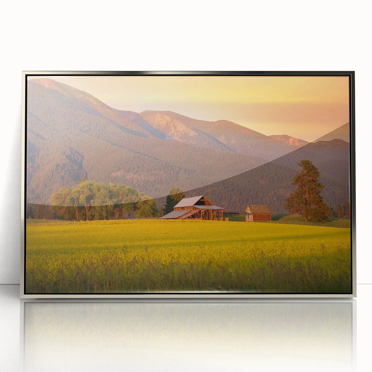 Mid-century modernist art depicting Montana scenery in muted earth tones on a silver-framed acrylic print.