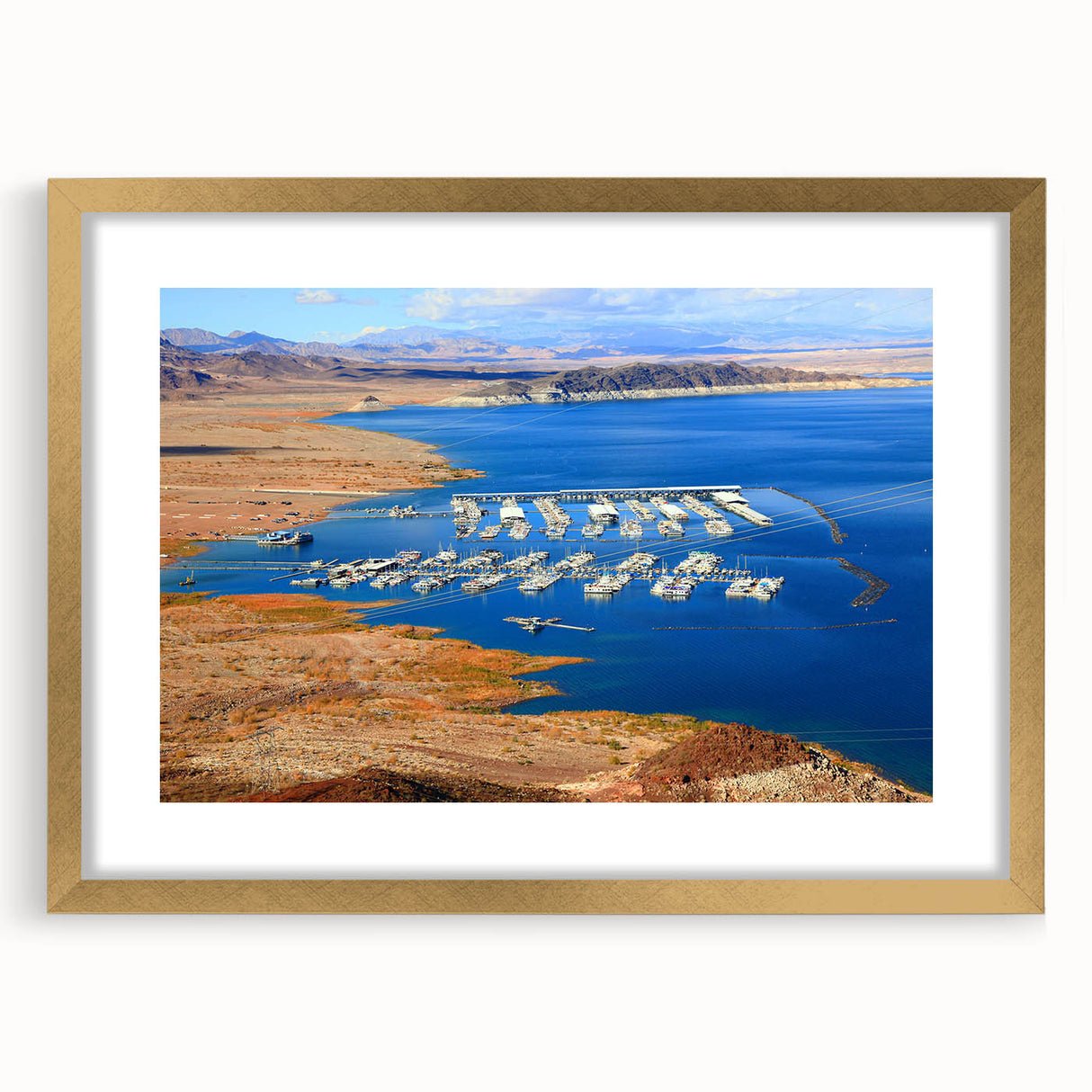 Extra large abstract art print of Lake Mead with textured details in muted blues and greens, framed in gold.