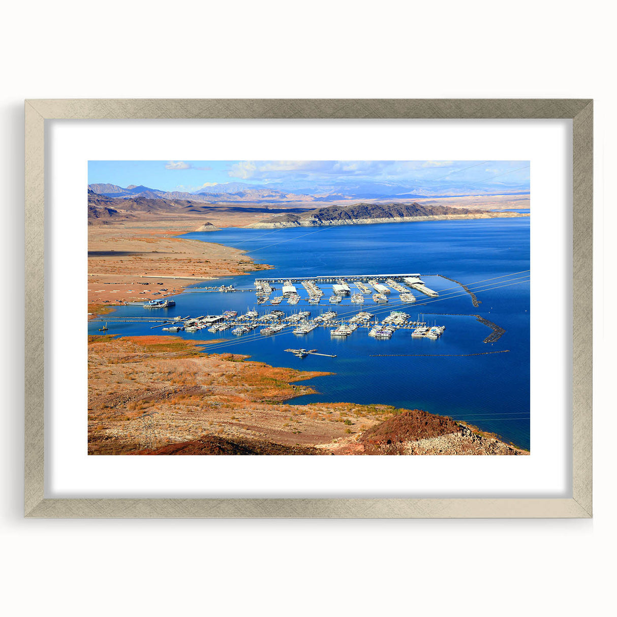 Textured abstract art print of Lake Mead in muted blue and gray tones on a framed canvas, ideal for bedroom wall decor.