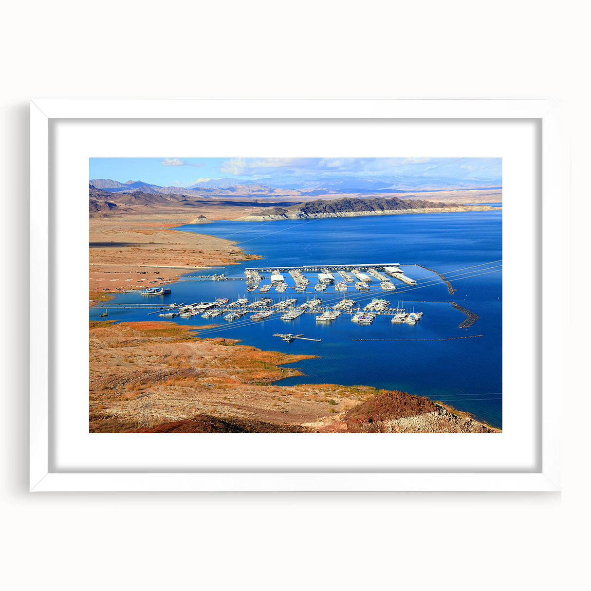 Abstract art print of Lake Mead in muted blue and green tones on a white framed mat, ideal for dining room decor.