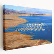 Side view of a stretched canvas depicting Lake Mead with vivid blue and earthy brown tones.