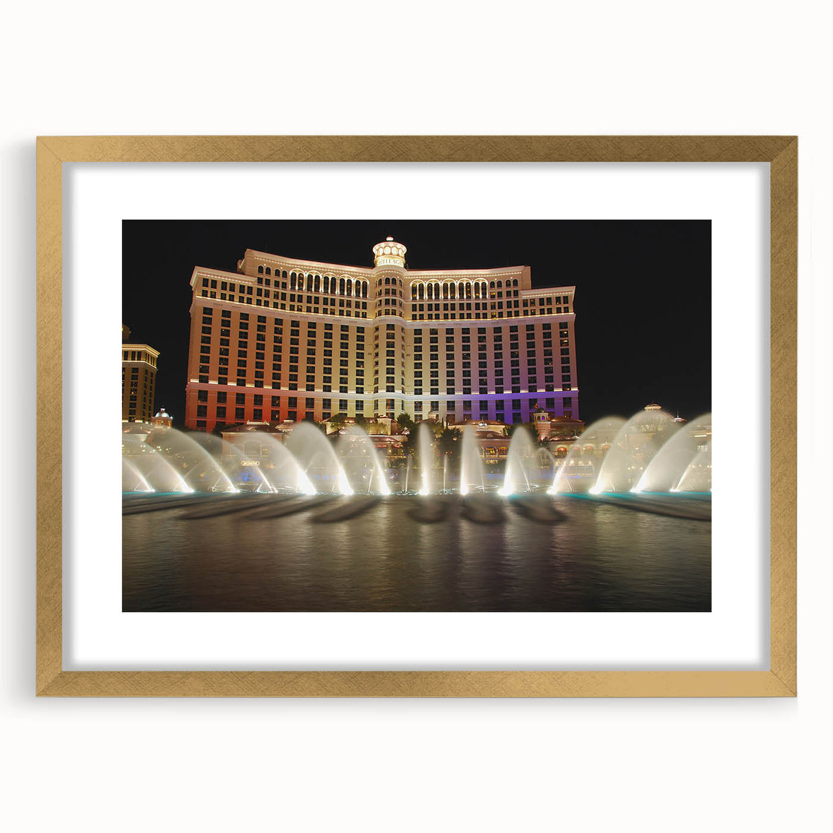 Extra large abstract art print of Las Vegas scenery in gold frame, featuring textured details in vibrant colors.