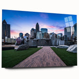 Acrylic print of a large abstract depiction of the Charlotte skyline in muted blue and gray tones.