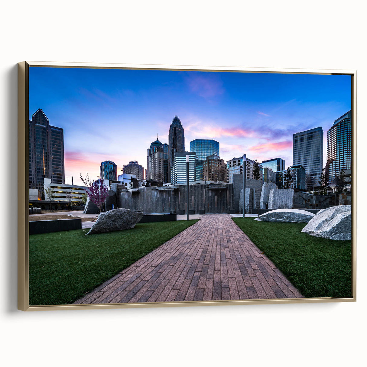 Framed canvas of Charlotte, North Carolina skyline in muted gold and black tones, ideal for bedroom wall decor.