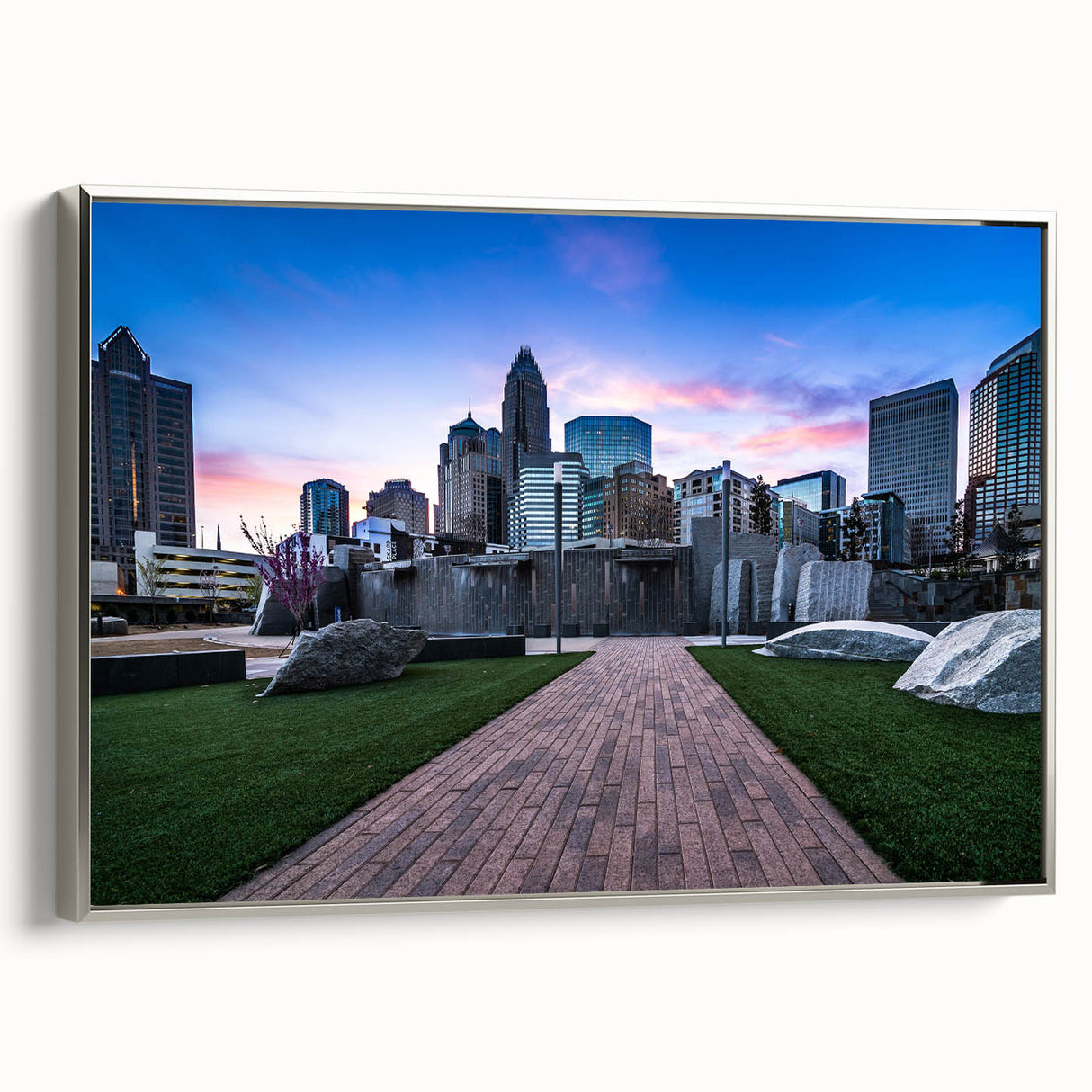 Framed canvas of a vintage-style Charlotte, North Carolina landscape with colorful accents, ideal for office decor.