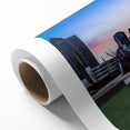 Art Deco style poster of Charlotte, North Carolina skyline in pastel hues on rolled canvas, ideal for nursery wall art.