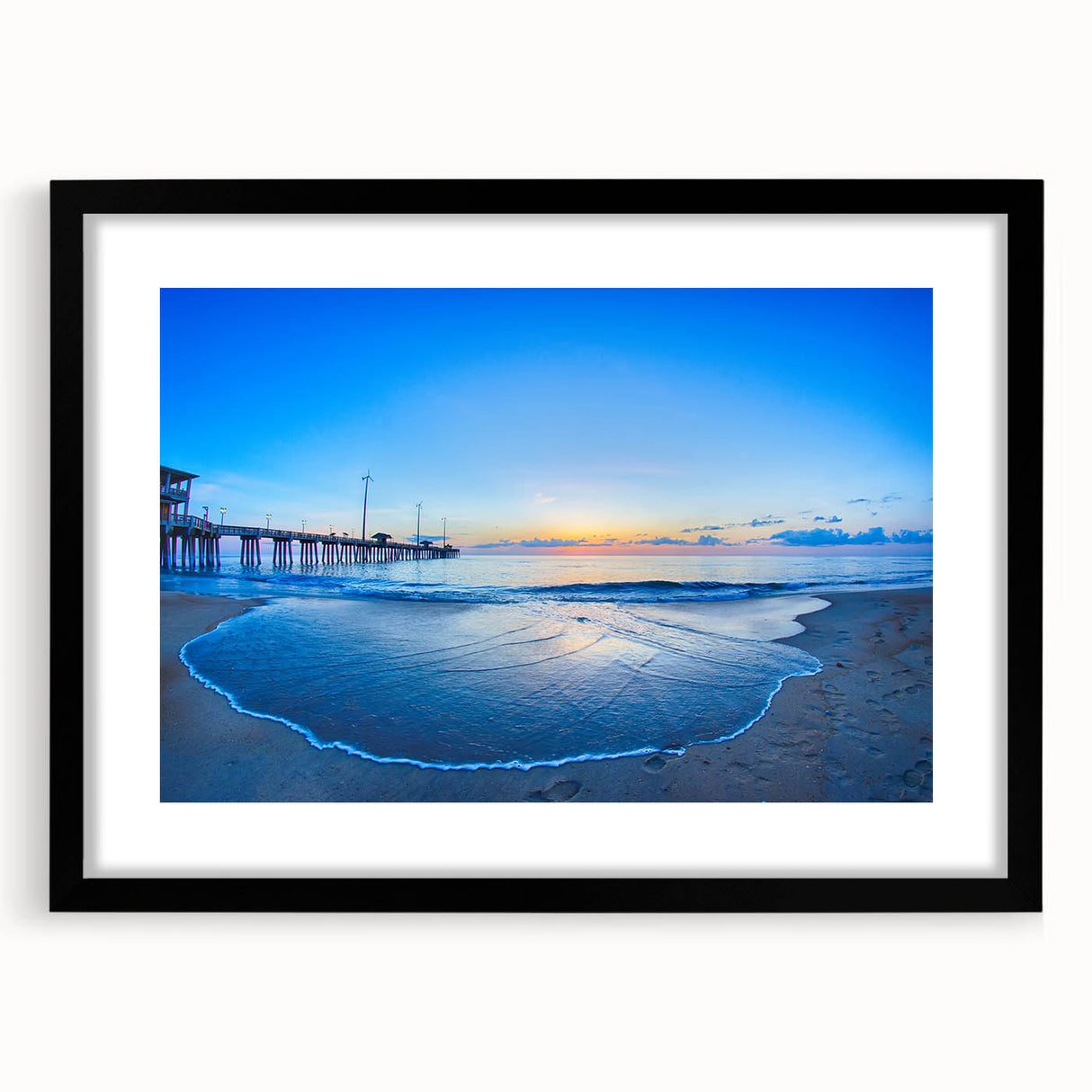 Abstract art print of the Outer Banks in vibrant colors, textured on a large black framed canvas.