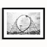 Abstract art print of Coney Island in vibrant colors, textured on a large black-framed canvas, ideal for living room decor.