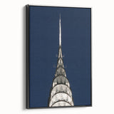 Black and white framed canvas featuring a side view of the Chrysler Building in a vintage poster art style.