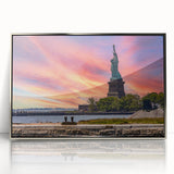 Mid-century modernist art depicting Ellis Island with muted blue and gray tones on a silver-framed acrylic print.