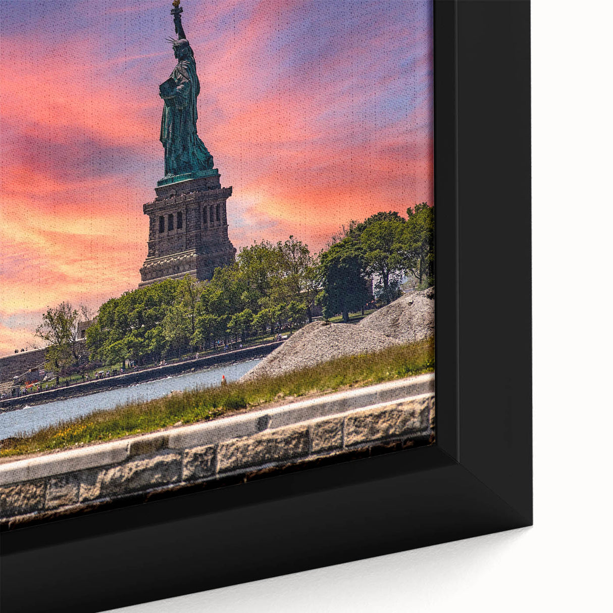Black wall art featuring a textured depiction of Ellis Island, with colorful accents, framed on canvas.