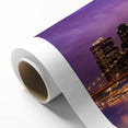 Art Deco style poster of Manhattan skyline in muted gray and blue tones on rolled canvas, ideal for nursery wall art.