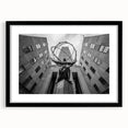 Colorful abstract art print of NYC skyline, in a black frame with mat, suited for living room decor.