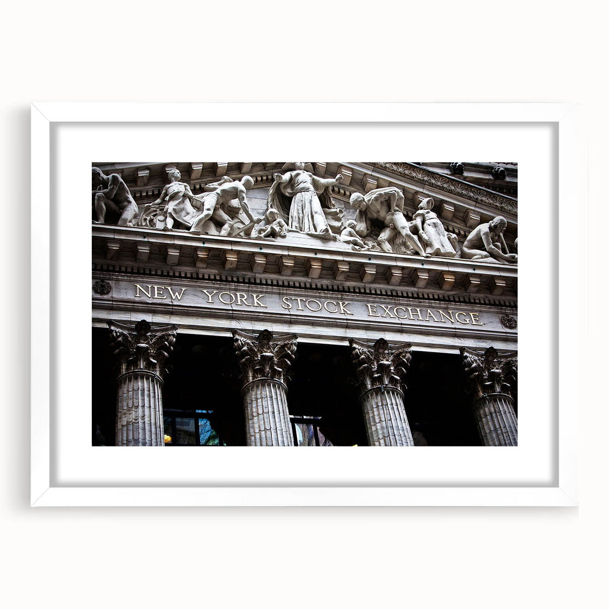 Abstract art print of New York City skyline in muted gray and blue tones, framed with a white mat.
