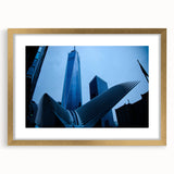 Extra large abstract art print of NYC skyline in muted gray and gold tones on a textured canvas, framed in gold.