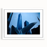 Abstract art print of New York City's skyline in muted gray tones on a framed white mat, ideal for dining room decor.