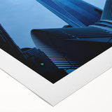 Art deco poster featuring the NYC skyline with muted gray and blue tones on rolled canvas, suitable for dining room wall art.