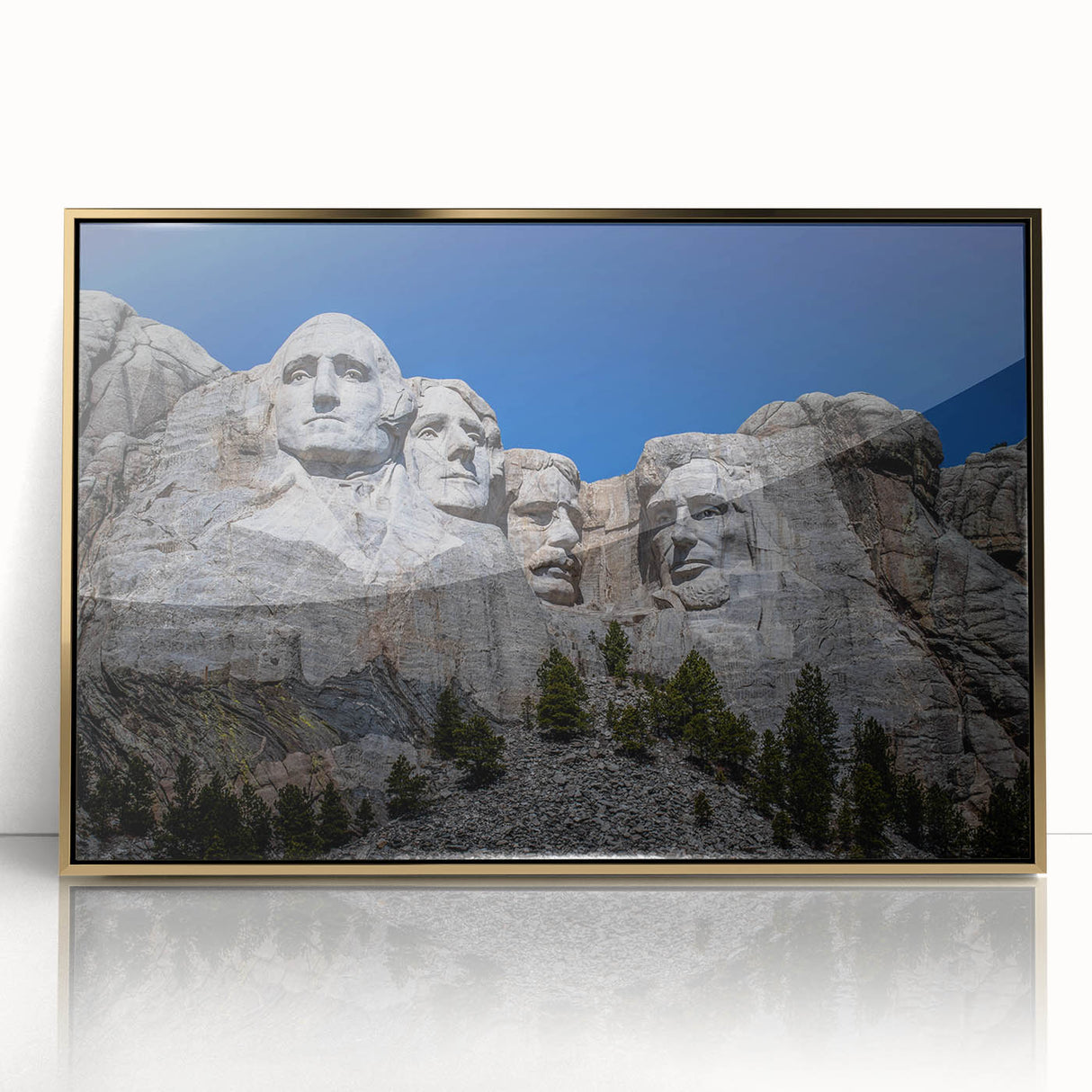 Acrylic print of Mt. Rushmore with a gold frame, featuring muted earth tones, ideal for modern art wall decor.