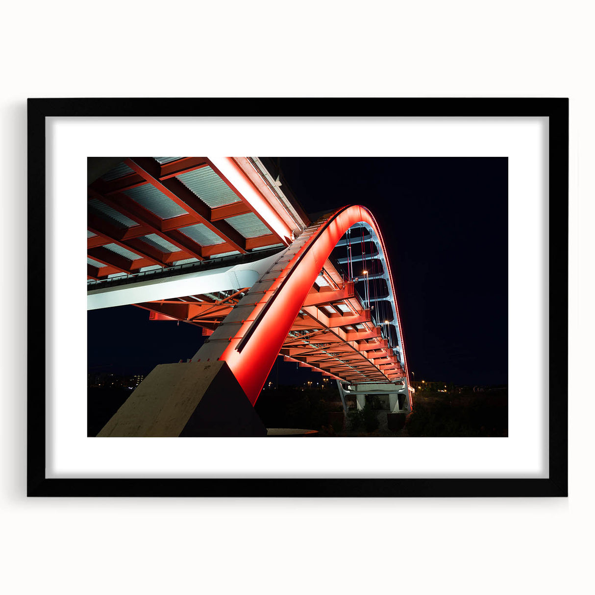 Abstract art print of Nashville skyline in vibrant colors on a large framed canvas, ideal for living room decor.