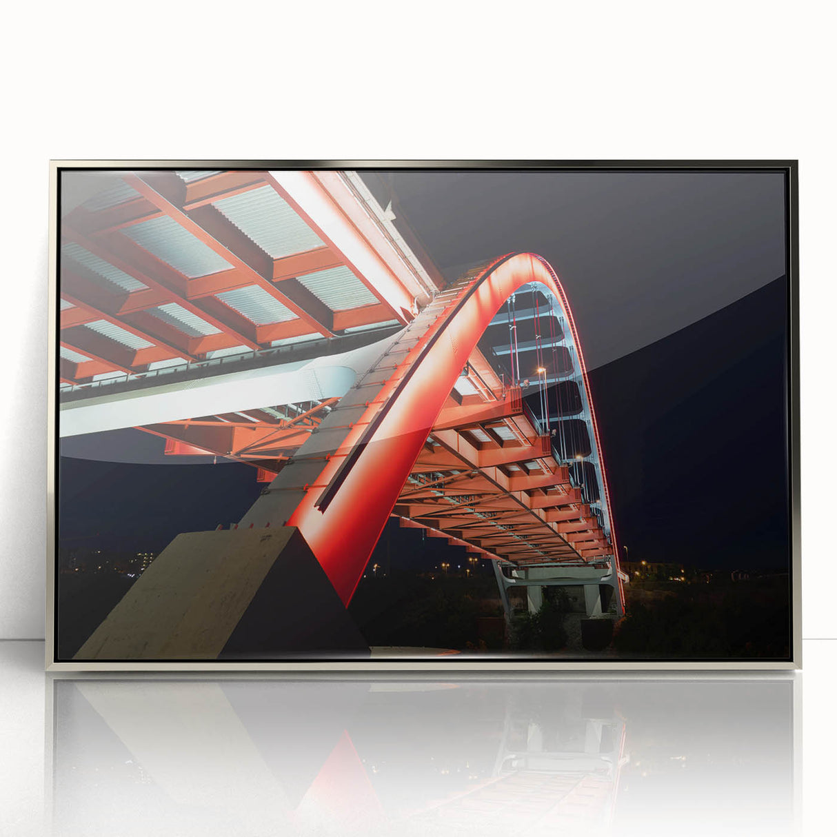 Mid-century modernist art depicting Nashville skyline in muted gray and blue tones on a silver-framed acrylic print.