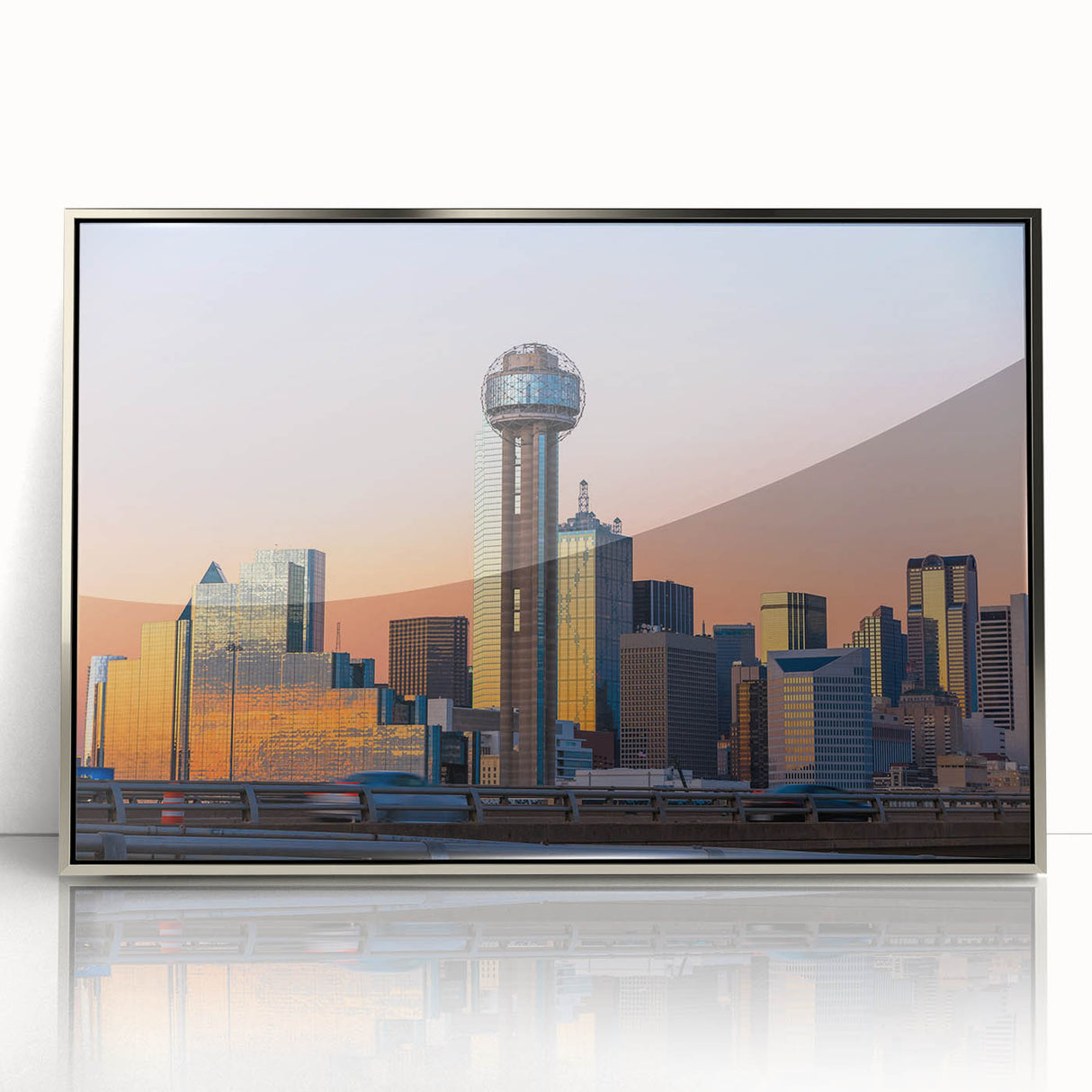 Mid-century modernist art depicting the Dallas skyline in muted gray and blue tones on a silver-framed acrylic print.