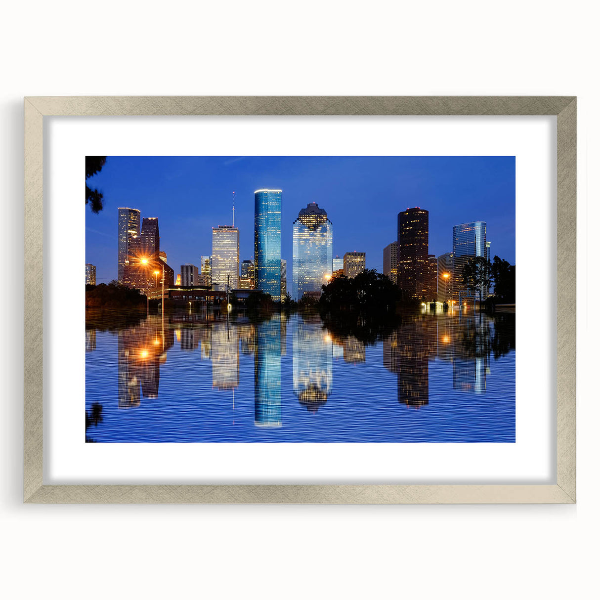 Textured abstract art print of Houston skyline in muted gray tones on a silver-framed mat, ideal for bedroom art.