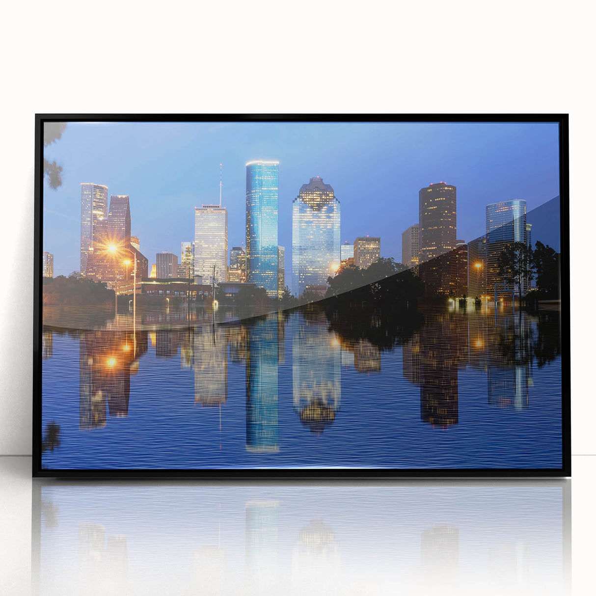 Large abstract wall art depicting the Houston skyline in muted gray and blue tones on a framed acrylic print.