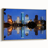 Framed canvas featuring a vintage-style landscape painting of Houston, Texas in muted gold and black tones.