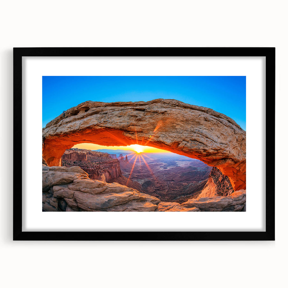 Extra large framed print of colorful, abstract Utah Arches on textured canvas, ideal for living room decor.