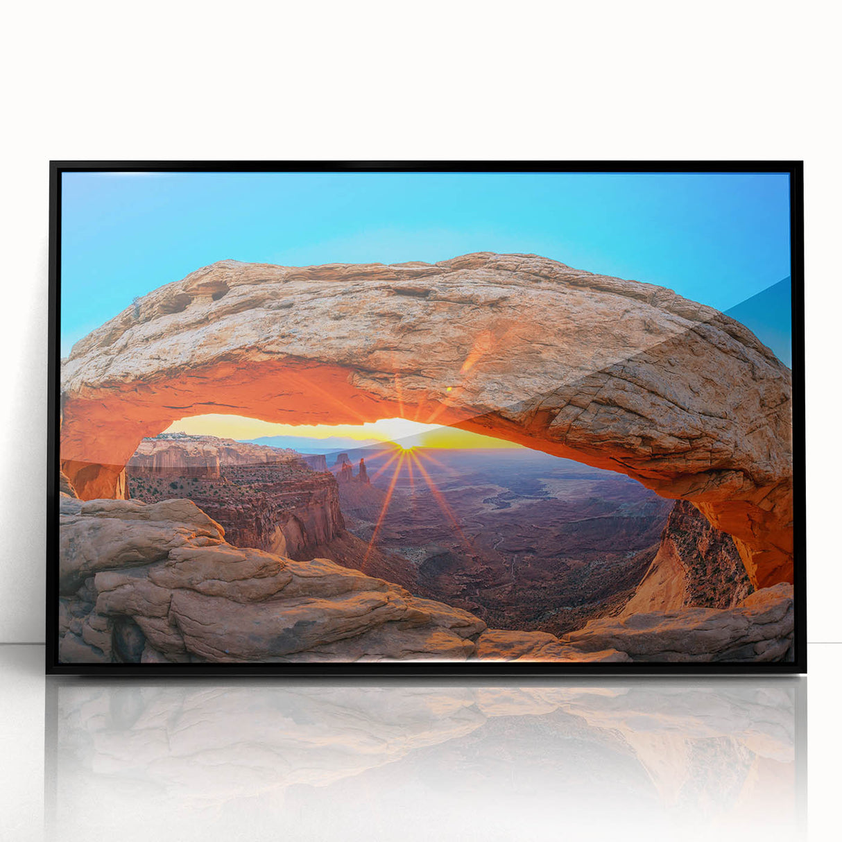 Large abstract wall art depicting Arches National Park in Utah, with muted earth tones on a black framed acrylic.