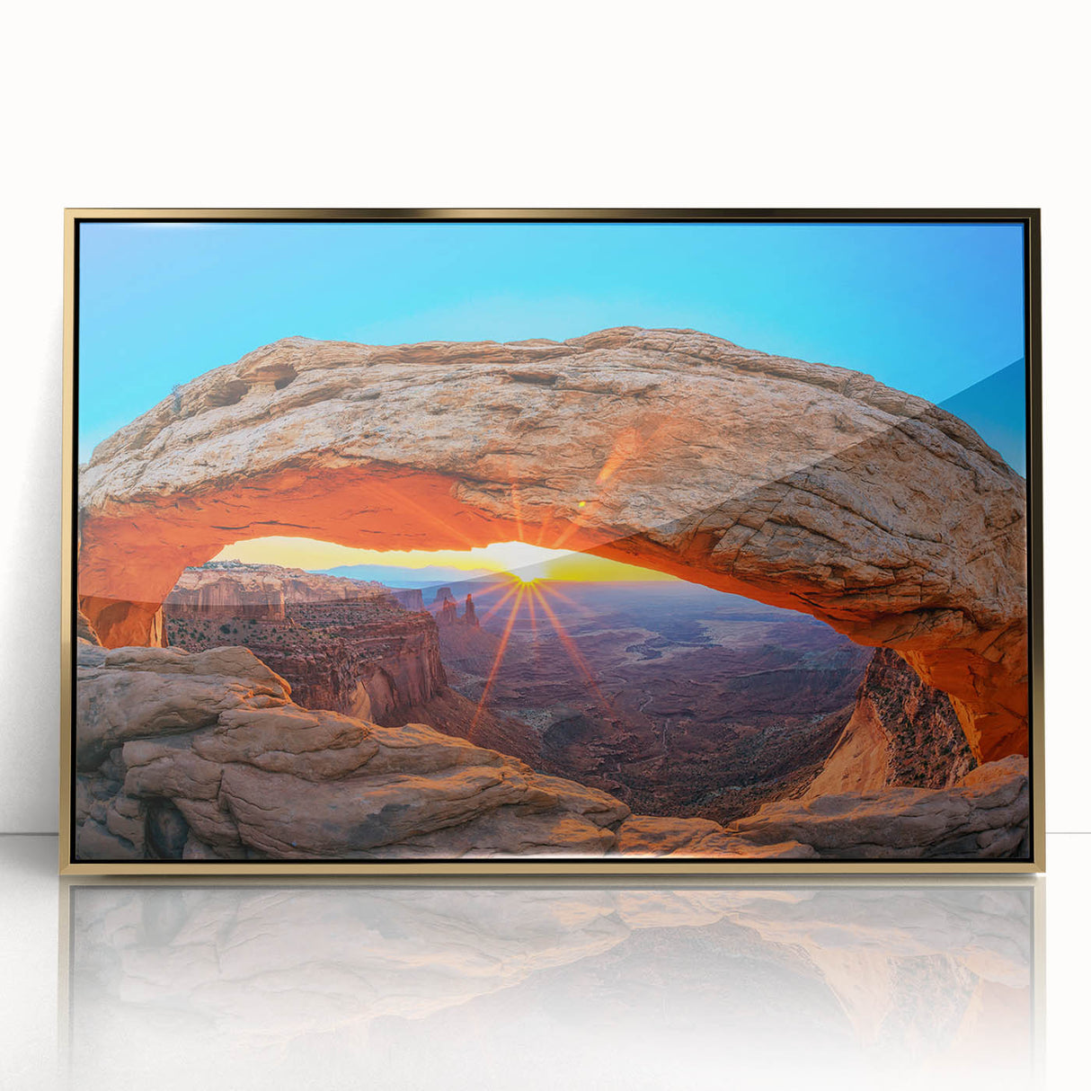 Framed acrylic print featuring a natural arch in Arches National Park, Utah, with warm earth tones.