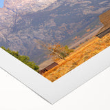 Art deco poster of the Grand Tetons in muted earth tones on rolled canvas, suitable for dining room wall art.