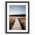 Extra large abstract art print of colorful, textured fall foliage, framed in black, ideal for living room decor.