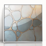 Framed acrylic artwork showcasing an abstract geometric design in white, featuring clean lines and modern aesthetics, perfect for contemporary decor.