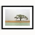 Extra large abstract art print featuring a colorful, textured depiction of a Mali scenery on a framed black mat.