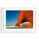 Extra large abstract art print of Moroccan scenery in textured whites and earth tones, framed with a white mat.