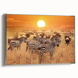 Framed canvas of a Tanzanian landscape with colorful skies and silhouetted acacia trees.