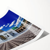 Extra large wall art featuring line art flowers in muted earth tones on a rolled canvas.