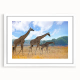 Abstract art print of African scenery in muted earth tones on a framed white mat, suitable for bedroom or dining room decor.