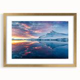 Extra large abstract art print of Antarctic scenery in textured strokes of blue and white, framed in gold.