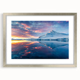 Textured abstract art print of an Antarctic landscape in muted blue and white, framed in silver, ideal for bedroom art.
