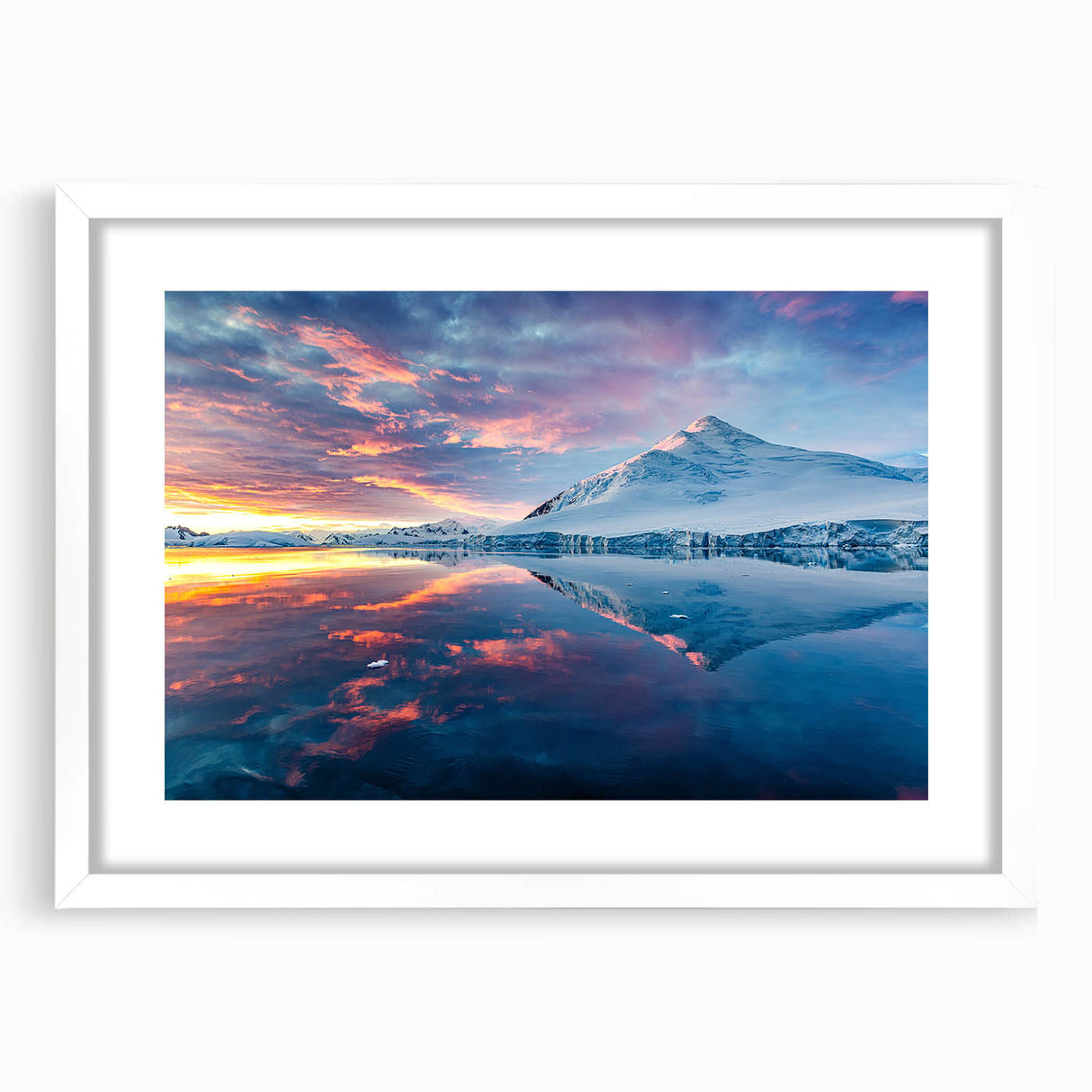 Abstract art print of an Antarctic landscape in muted blue and white tones on a framed canvas.