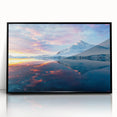 Large abstract wall art depicting an icy Antarctic landscape in muted blue and white tones, framed in black acrylic.