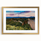Extra large framed wall art depicting an abstract rendition of the Great Wall of China in textured gold and earth tones.