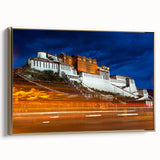 Framed canvas of a Tibetan landscape in muted gold and black, ideal for bedroom wall art.