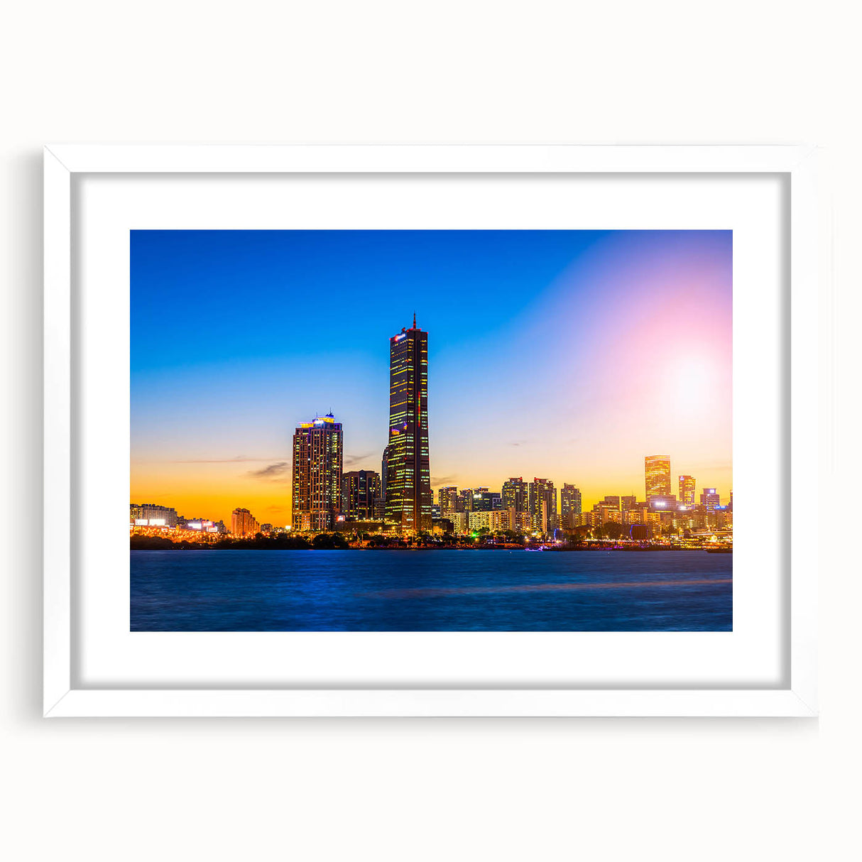 Abstract art print of Seoul skyline in muted gray and blue tones on a framed white mat, ideal for dining room decor.