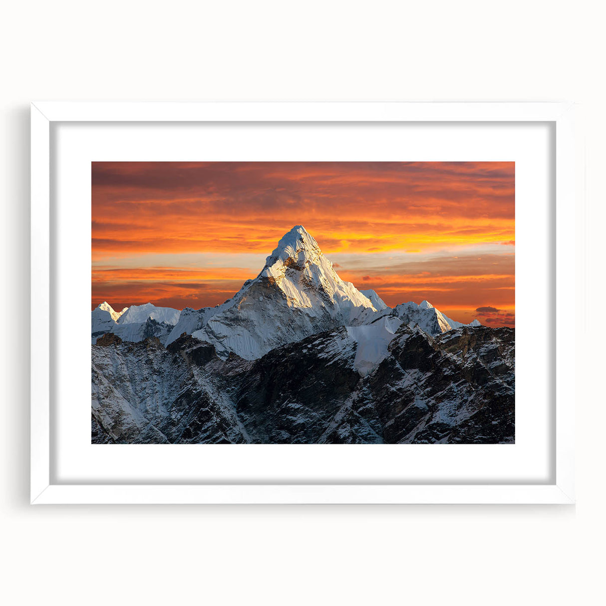 Abstract art print of a stylized Mount Everest in cool blue and white tones, framed with a white mat.