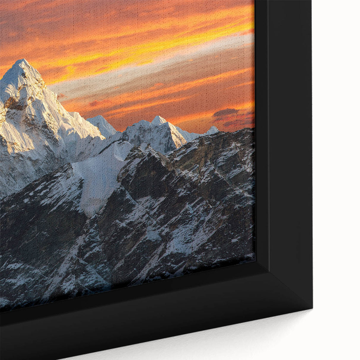 Extra large black wall art featuring a textured depiction of Mount Everest in vibrant colors on a framed canvas.